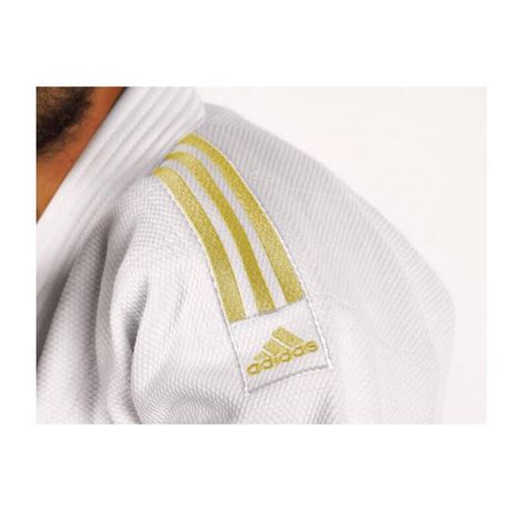 adidas zwart met gouden strepen